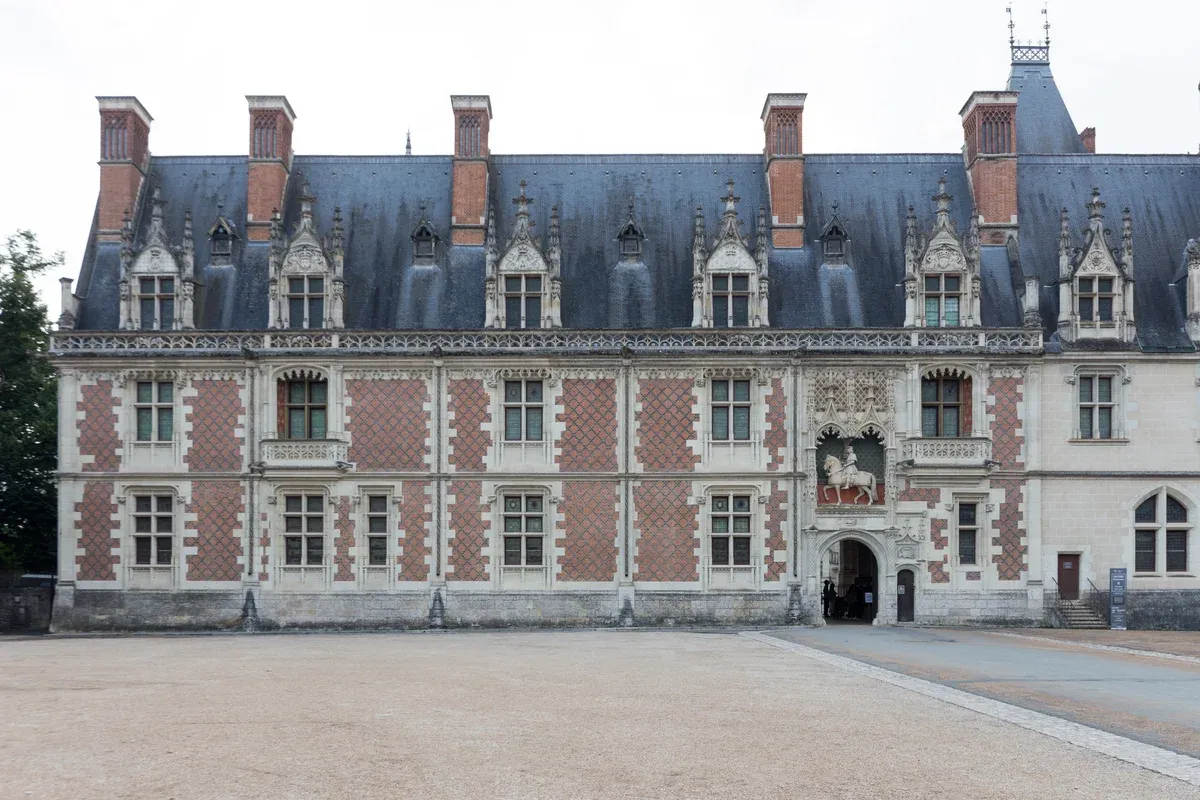 Château royal de Blois courtyard facade on a Loire Valley castles tour